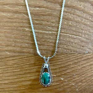 Silver and green stone pendant with chain